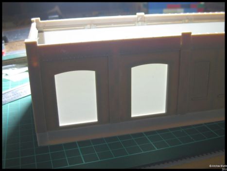 A closeup (lit from behind) showing the truck dock ready to have its doors cut out.