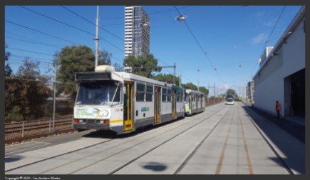 A1 class tram 240 sits in April sunshine after the morning peak on Southbank's 1 road in 2018